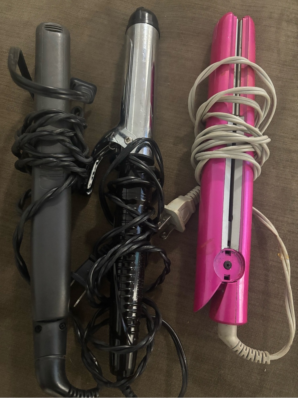 Set of Three Hair Styling Tools - Black, Silver, Pink